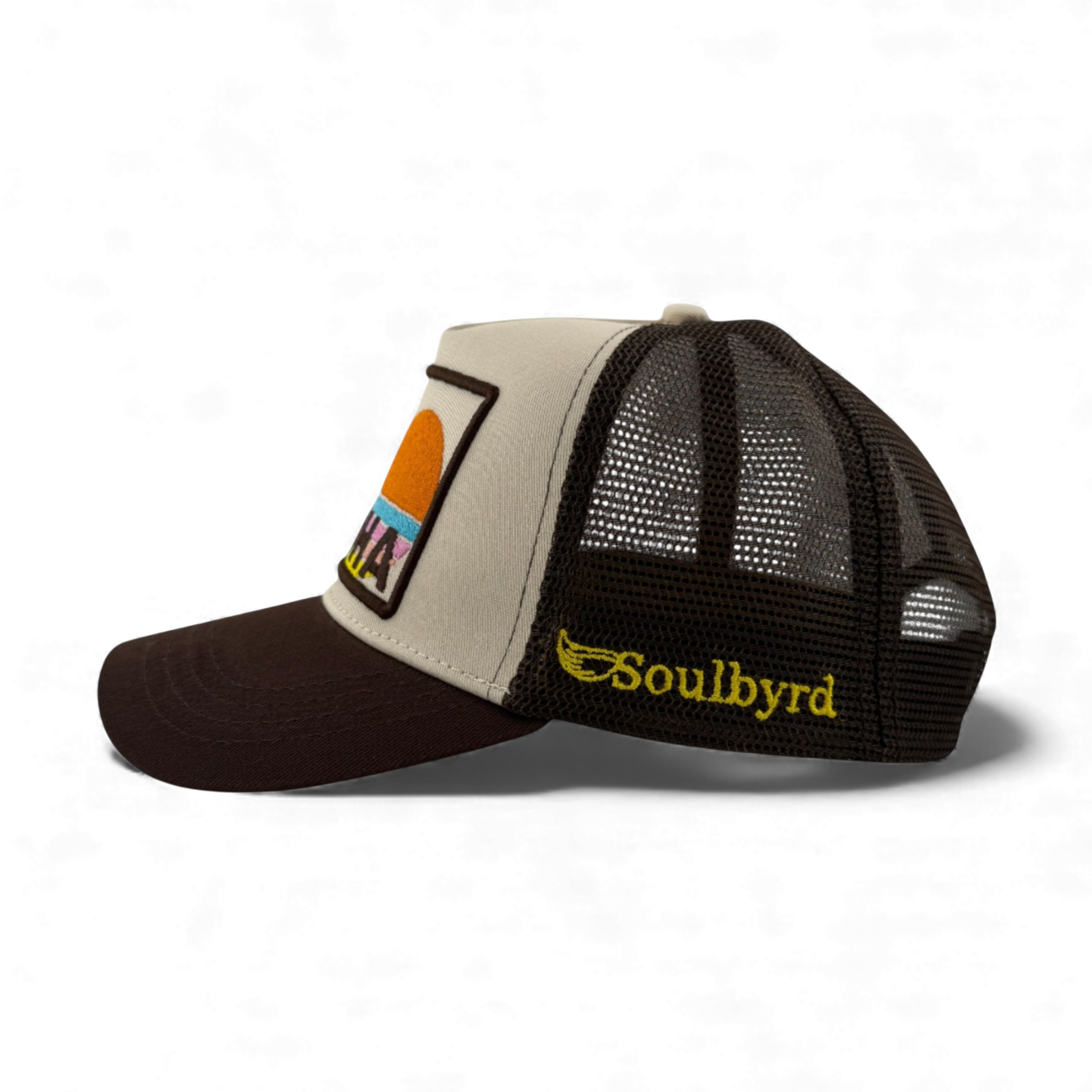 Side profile of Soulbyrd Aloha trucker hat showing adjustable snap closure
