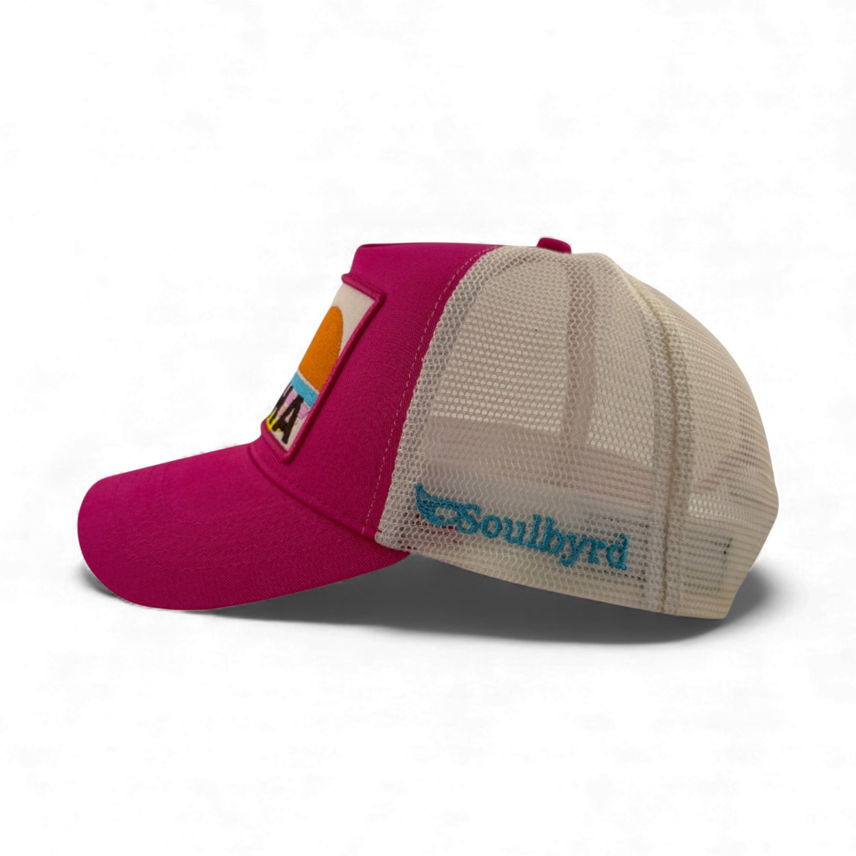 Side view pink Aloha trucker hat showing Soulbyrd logo on beige mesh