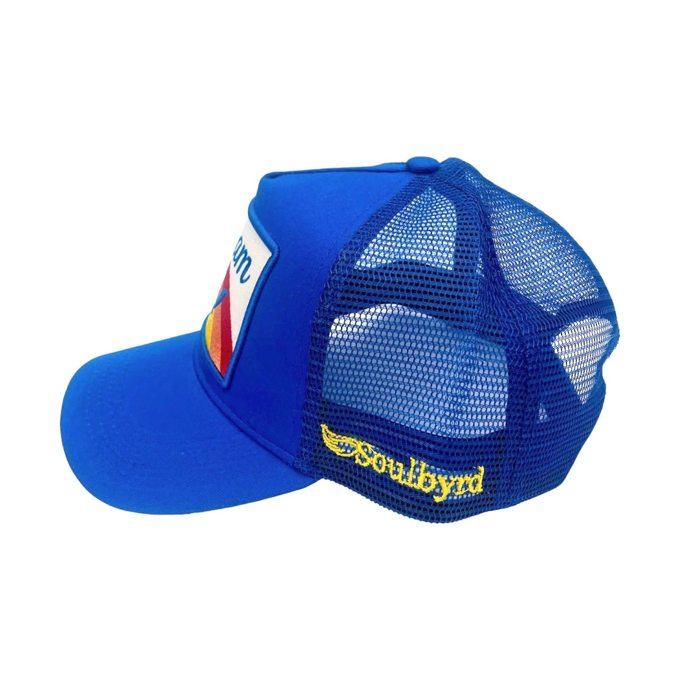 Side view of royal blue Soulbyrd trucker hat with mesh back