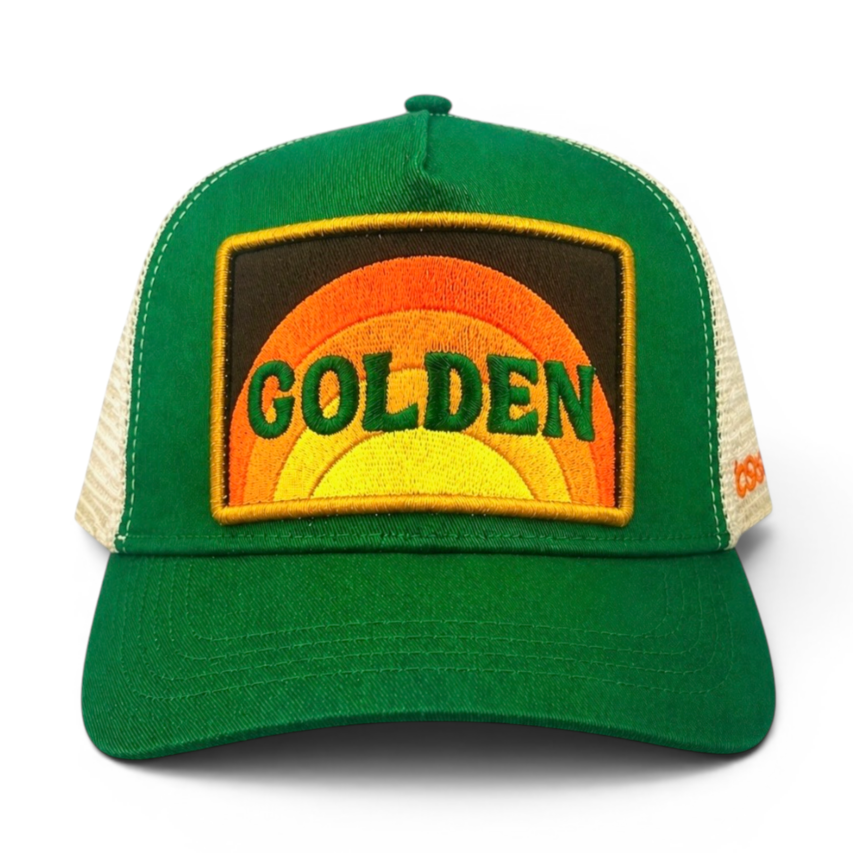 Green cotton trucker hat with embroidered golden sunburst patch