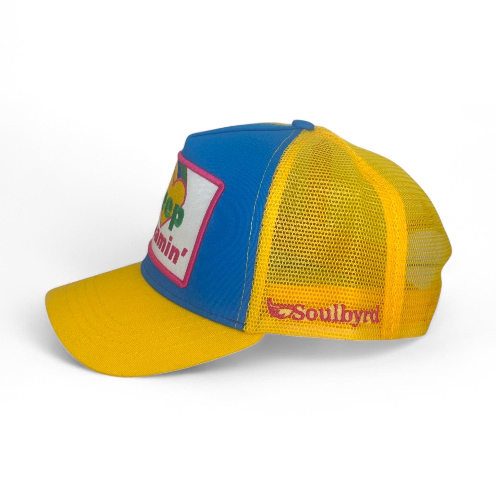 Soulbyrd blue and yellow mesh trucker hat showing red brand logo on back