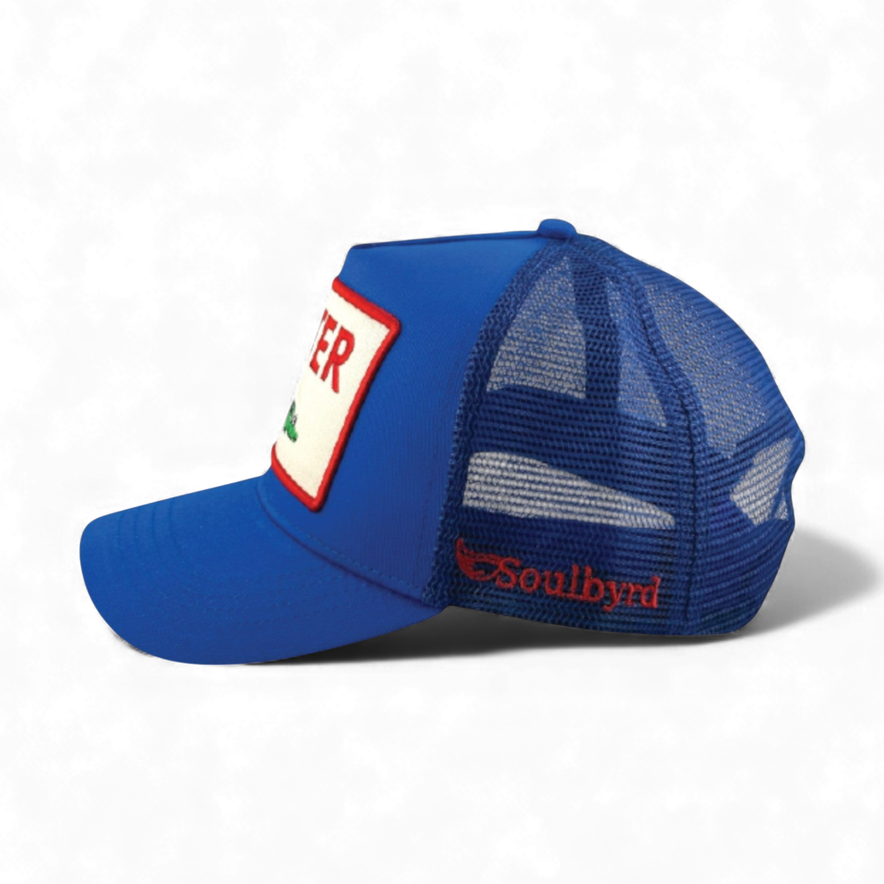 Royal blue Soulbyrd trucker hat side view with mesh back and embroidered logo