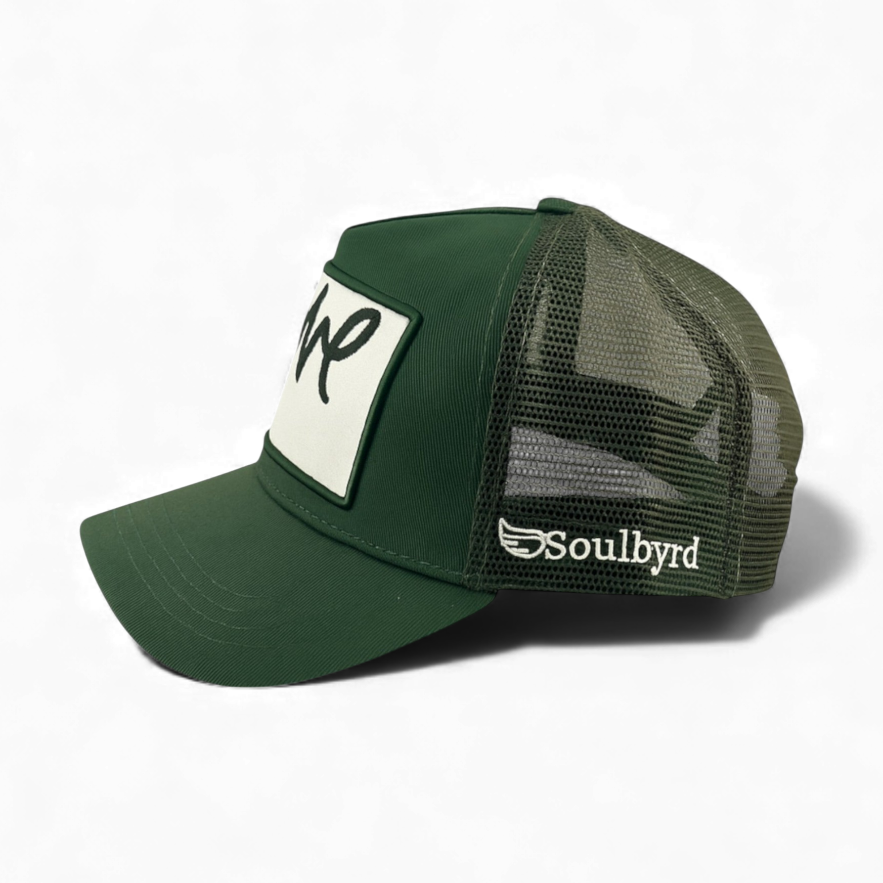 Side view of Soulbyrd hunter green mesh back trucker hat with winged logo