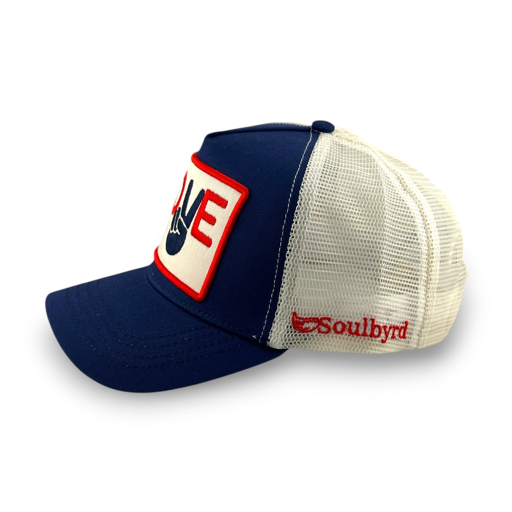 Navy Soulbyrd trucker hat with peace sign hand embroidery on white patch