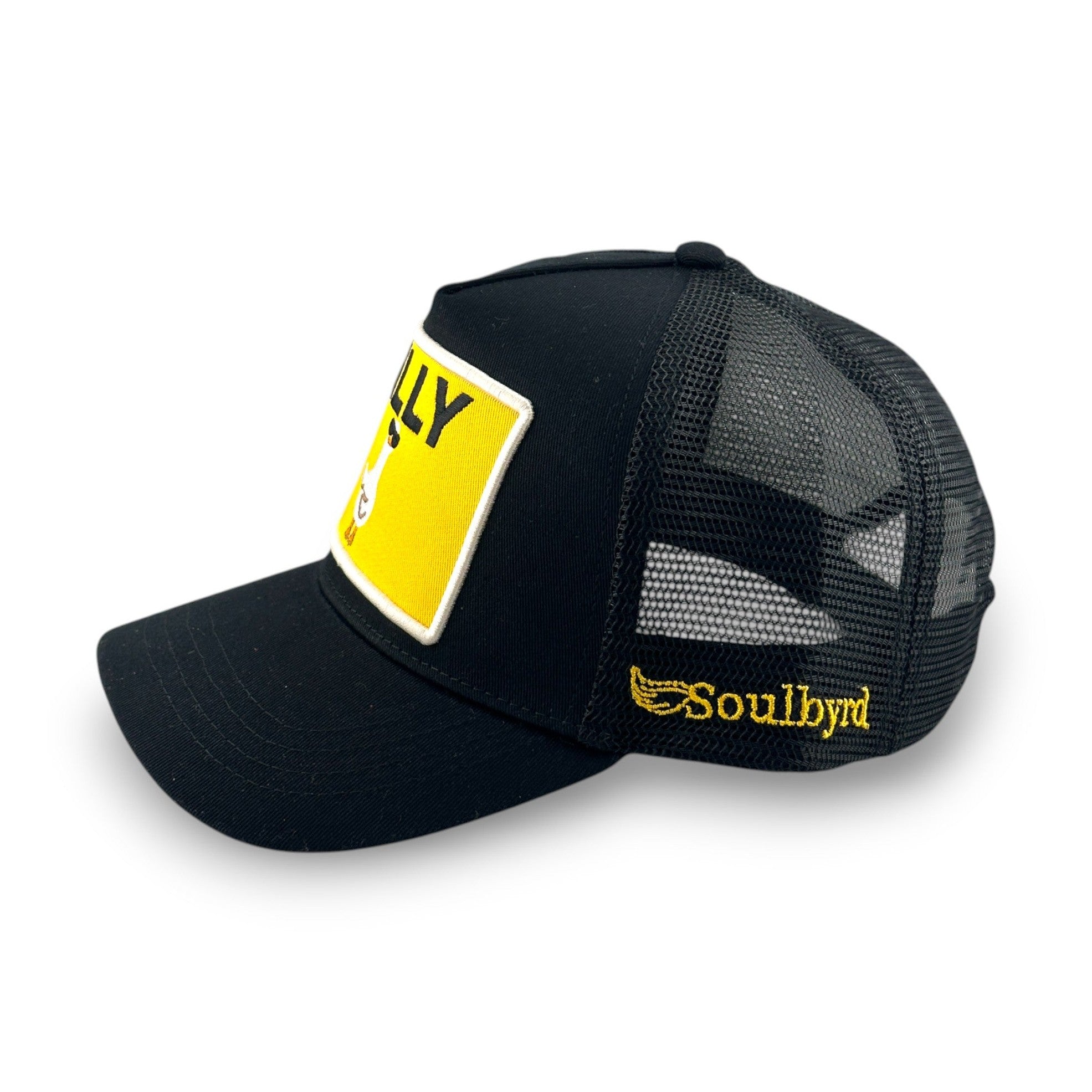 Side view of black mesh back trucker hat showing Soulbyrd wing logo and adjustable snap closure