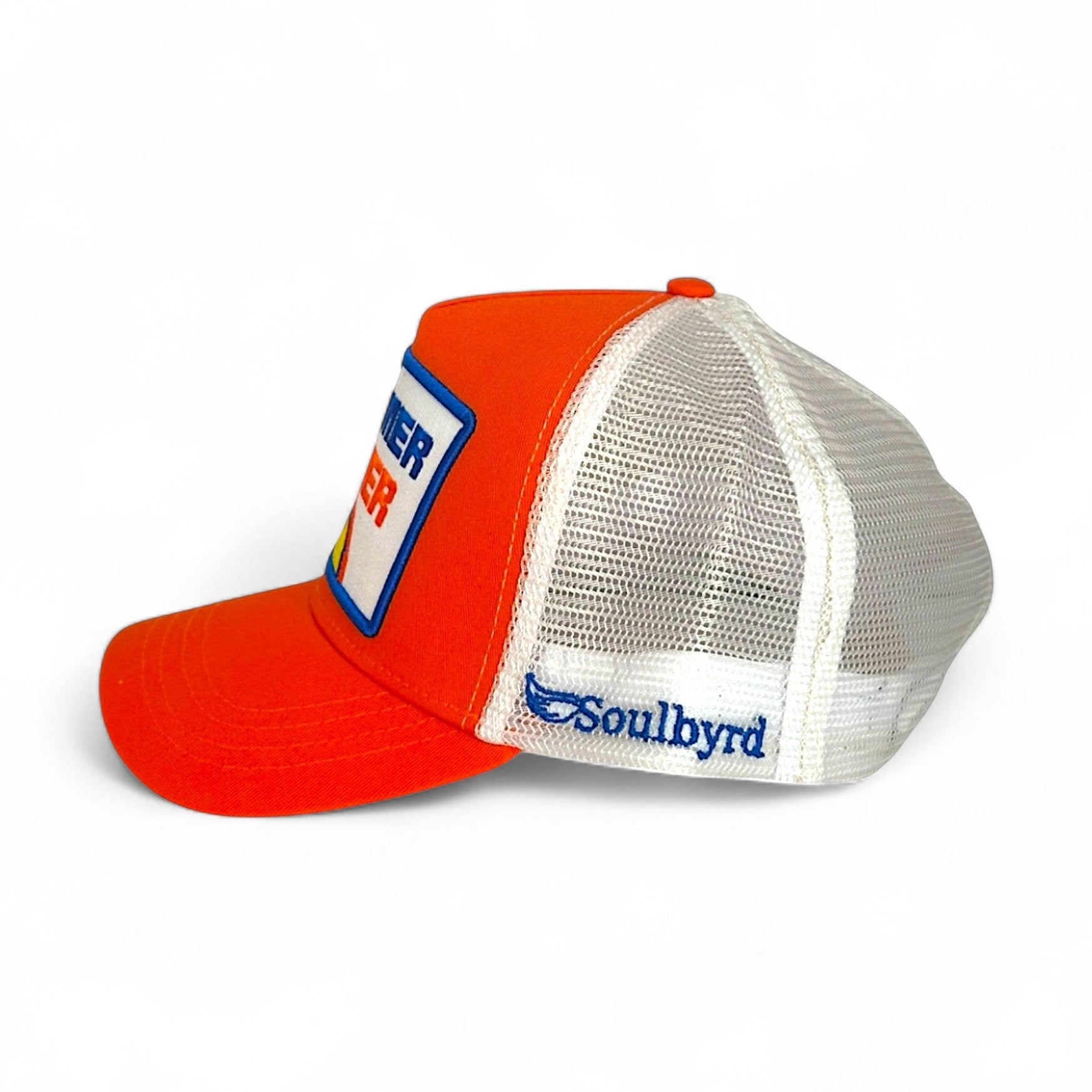 Orange Soulbyrd trucker hat side view with white mesh back and embroidered wing logo