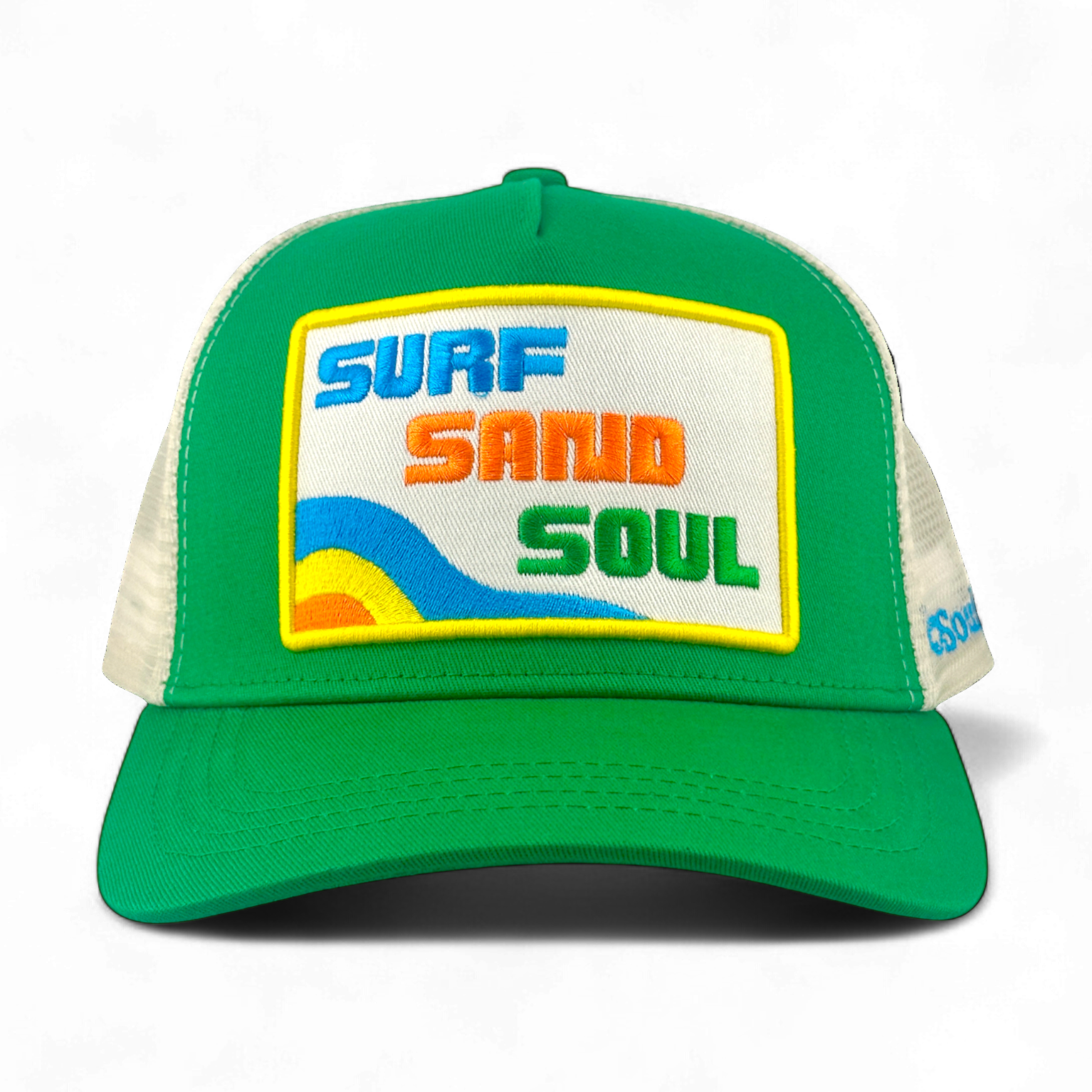 Green Surf Sand Soul trucker hat with embroidered wave and sun graphic on cotton twill front