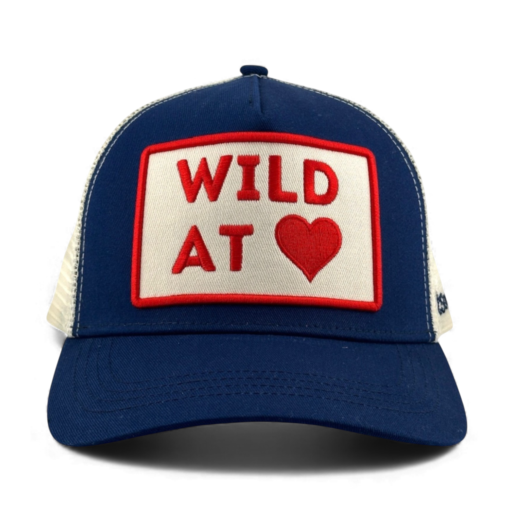 Navy blue and off-white mesh trucker hat featuring WILD AT HEART red embroidery
