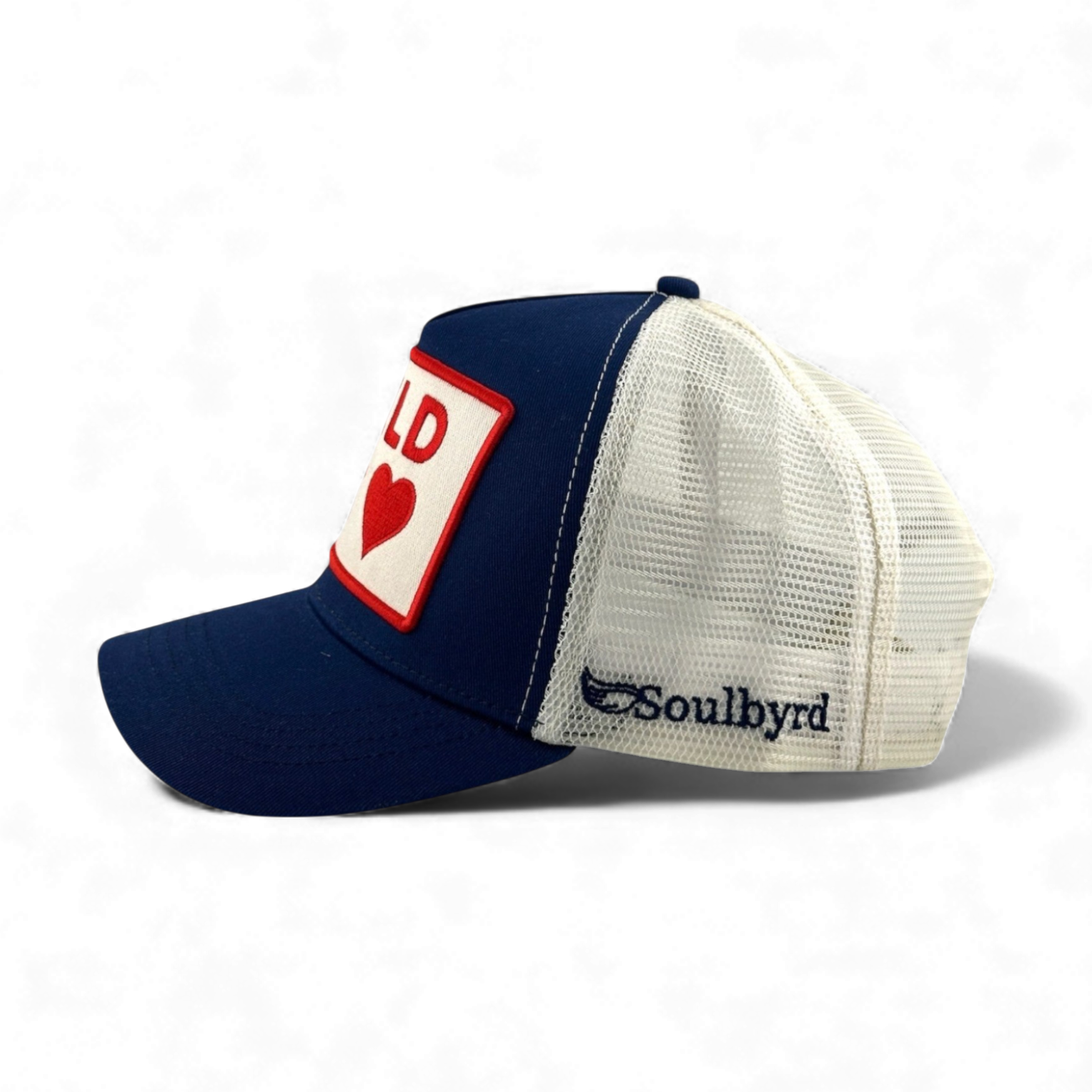 Navy cotton twill and off-white mesh trucker hat with Soulbyrd winged logo embroidery