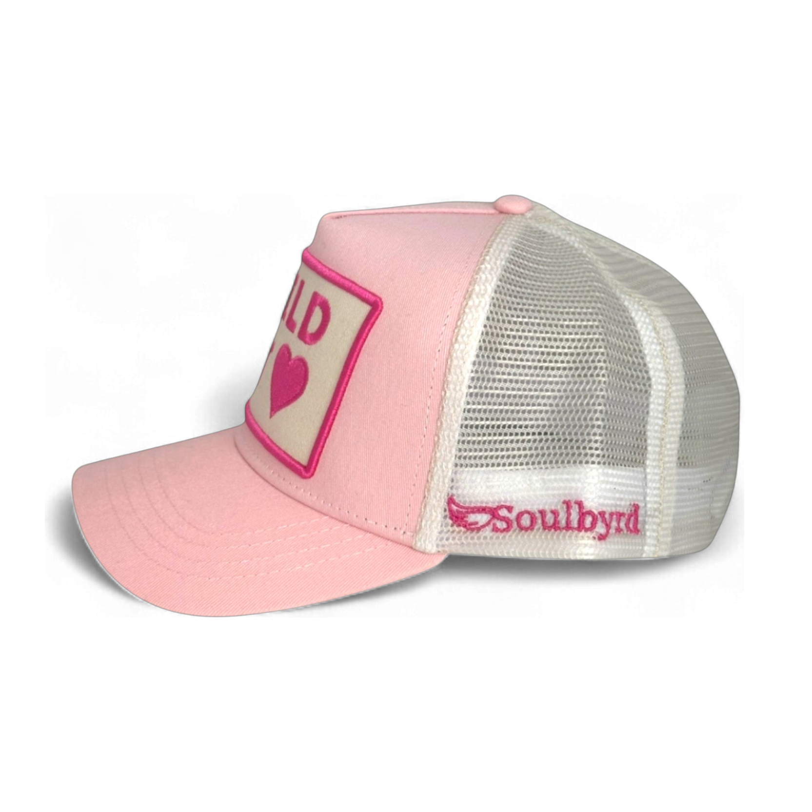 Pink Soulbyrd trucker hat side view with white mesh back and heart logo patch