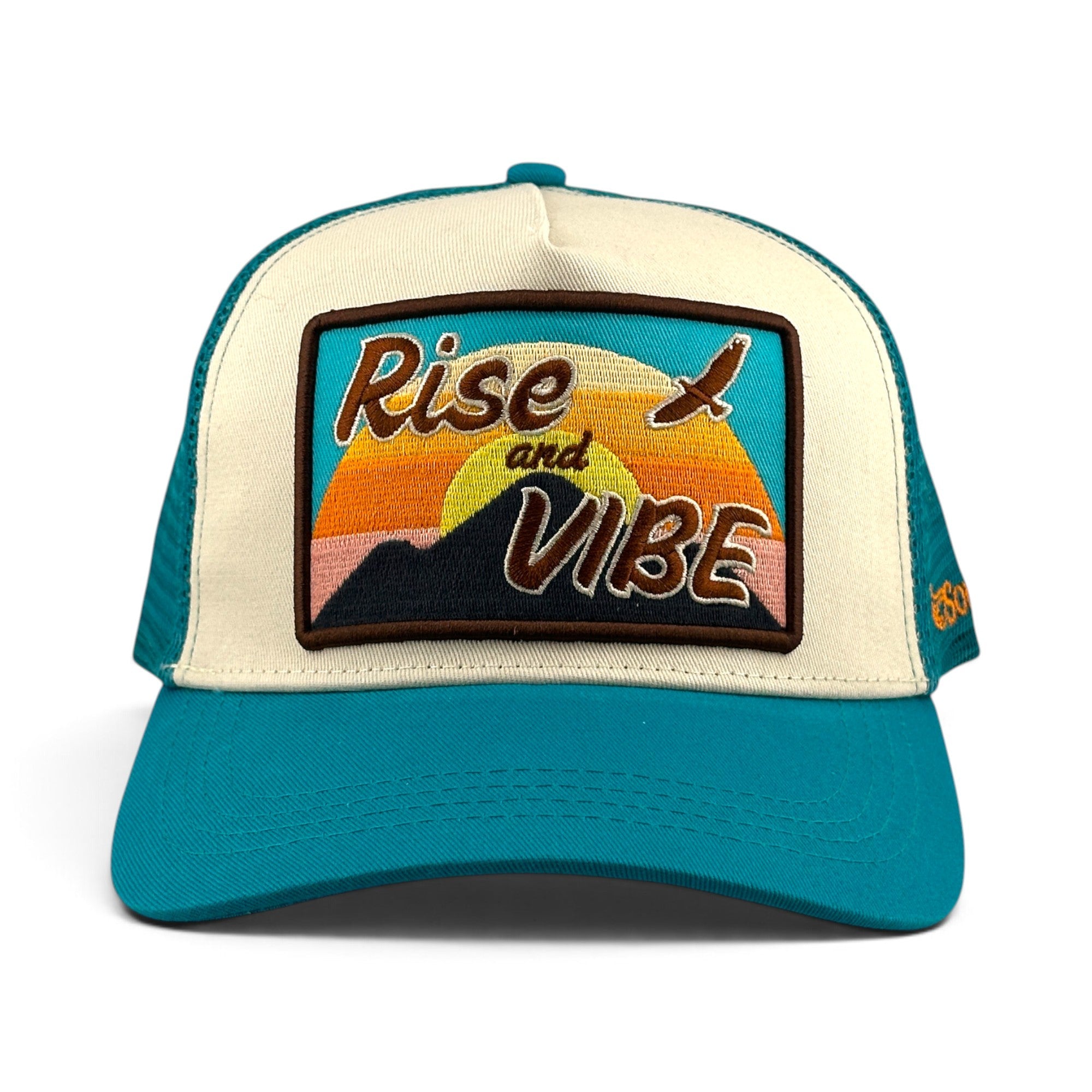 Soulbyrd Wholesale turquoise and cream 5-panel trucker hat with Rise & Vibe embroidered patch and mesh back